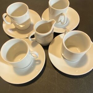 white china cup and saucer set